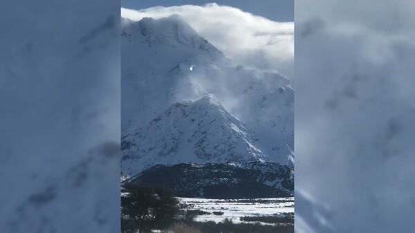 High wind, cloud weather conditions on a mountain range